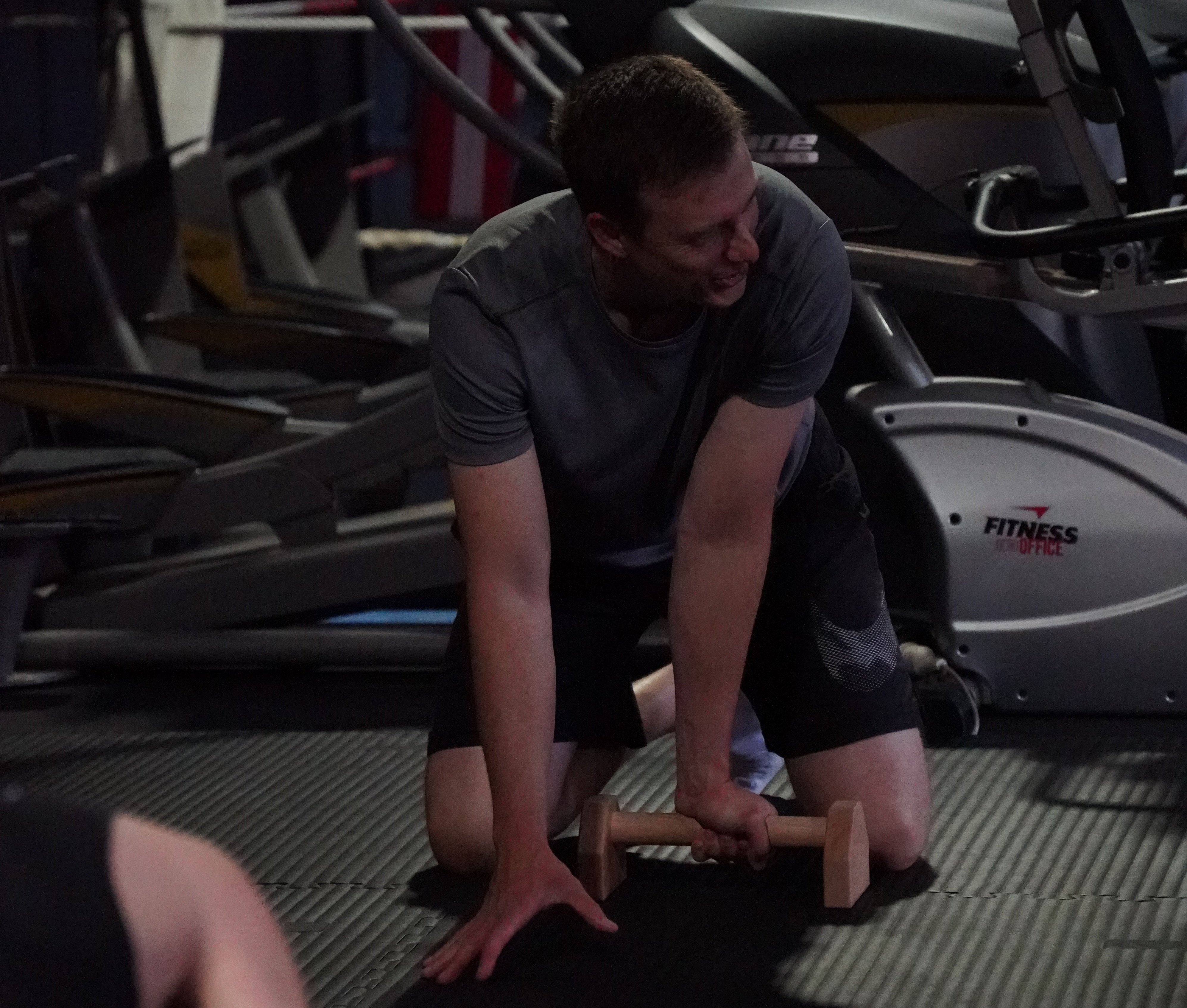 Beginner using parallettes for calisthenics push ups