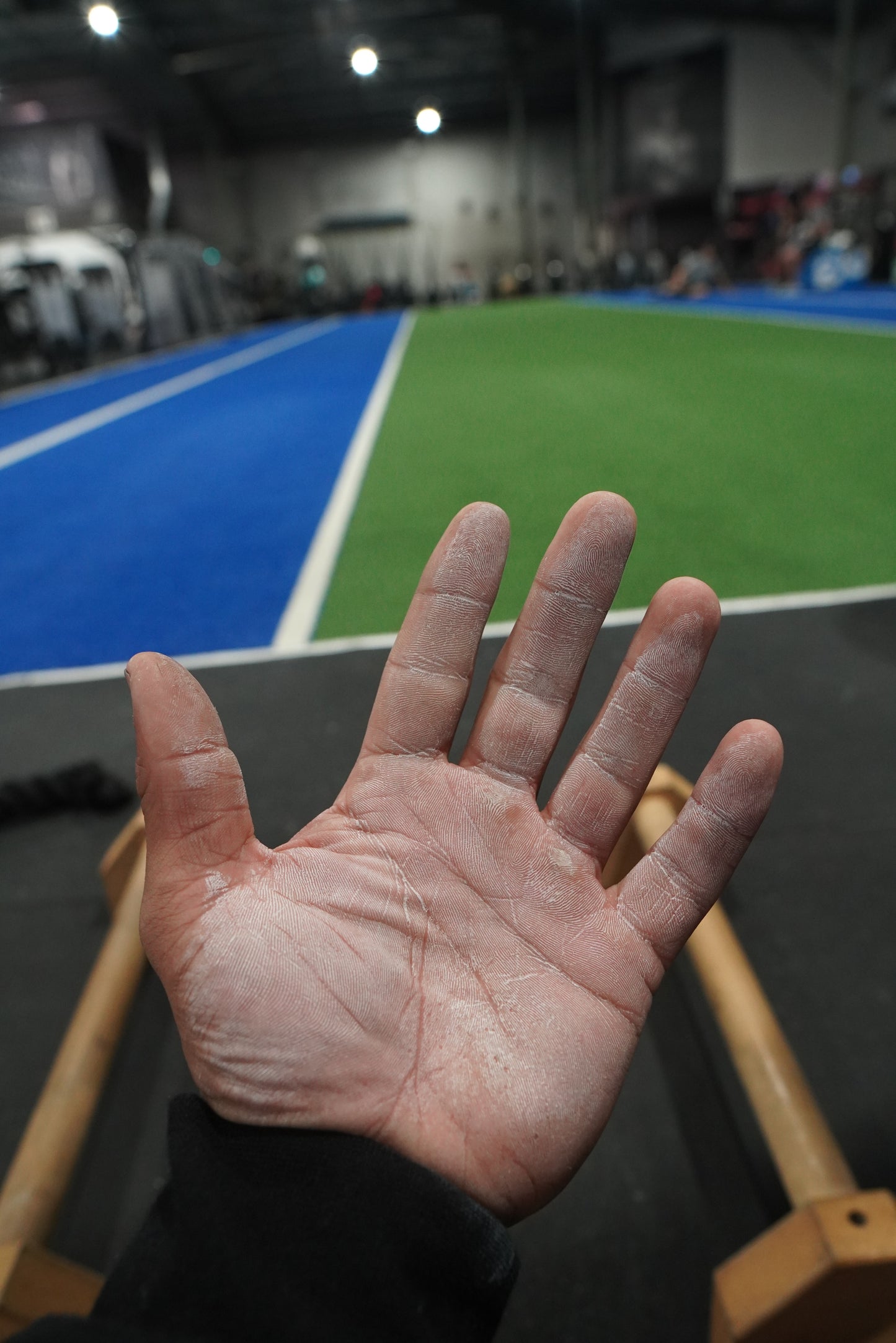 Close up of dry liquid chalk on a palm