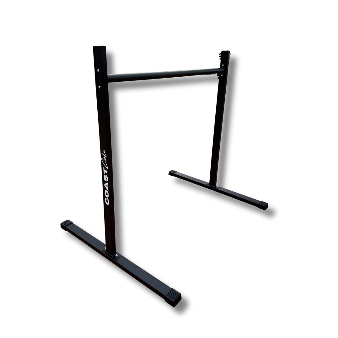 A black static bar used for calisthenics with Coast Cali logo on the vertical support.