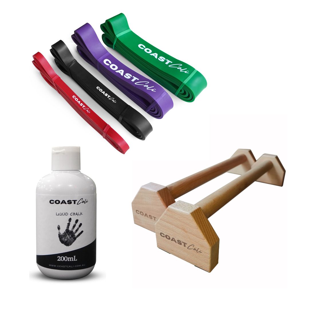 A set of 4 calisthenics resistance bands, parallettes and liquid chalk on white background.