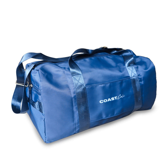 A navy blue duffle bag with the text 'COAST CALI' on the side, featuring a shoulder strap and carry handles.