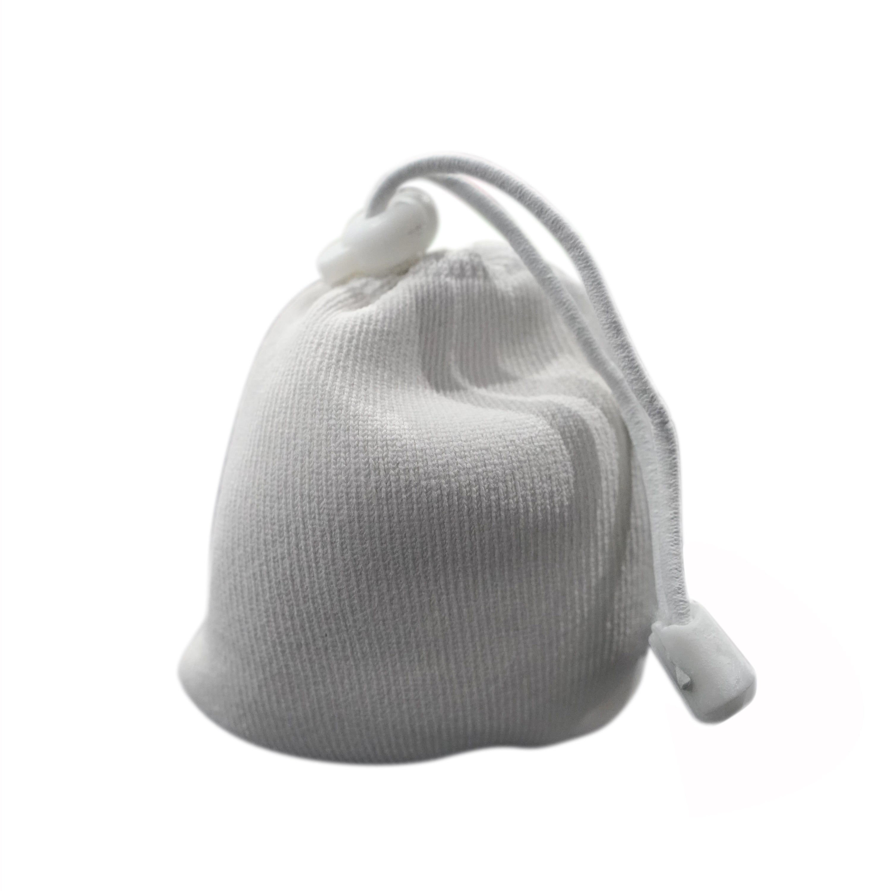 A white chalk ball with a drawstring, designed for use in weightlifting, rock climbing, and gymnastics to enhance grip.