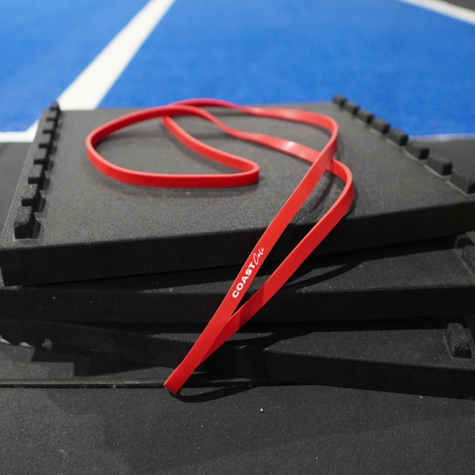 A red resistance workout band