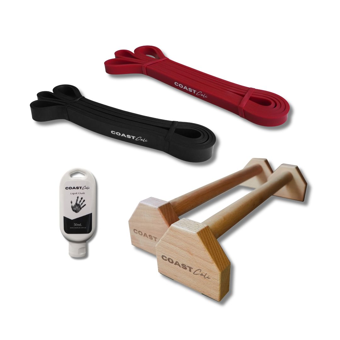 a calisthenics bundle with resistance bands parallettes and liquid chalk